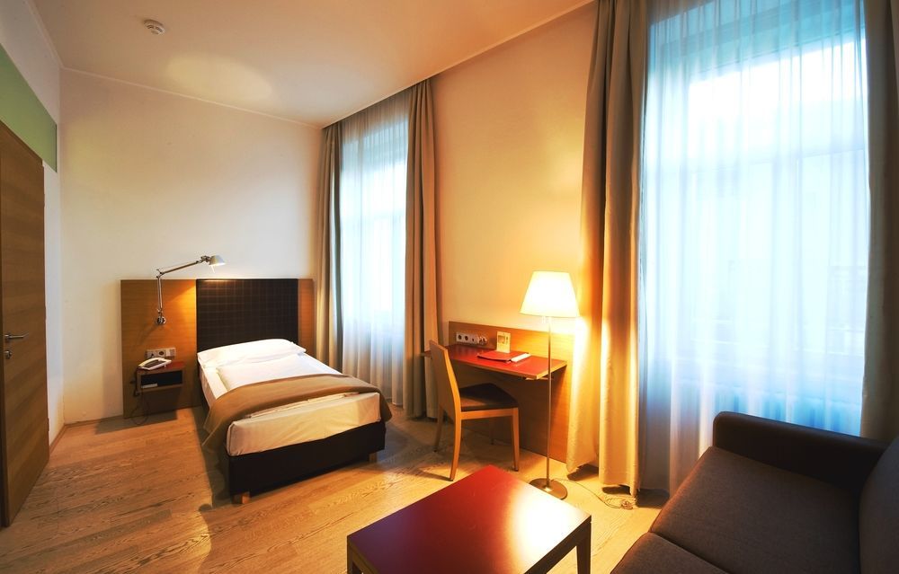 Hotel Stiegl Scala Bolzano Værelse billede